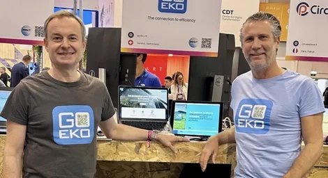 Daniel Eskenazi and Raphaël Herrera at GoEko Presentation Fair. Daniel Eskenazi and Raphaël Herrera at the GoEko stand during a presentation fair, both smiling in branded shirts.