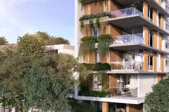 Sustainable Architecture for Greener Living. Modern residential building with greenery integrated into balconies and facade.