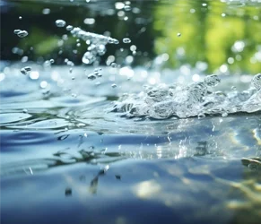 Smart Water Management for Sustainable Building Performance. Clear water splash representing efficient water use in construction and building operations.